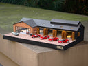 1:64 Bell Garage Diorama with opening display hall doors