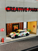 1:64 Car Culture Park Diorama with LED Garage (Pre-Order)