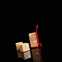 Red miniature hand truck for a garage display