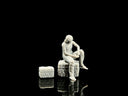 1:64 seated garage figure close view